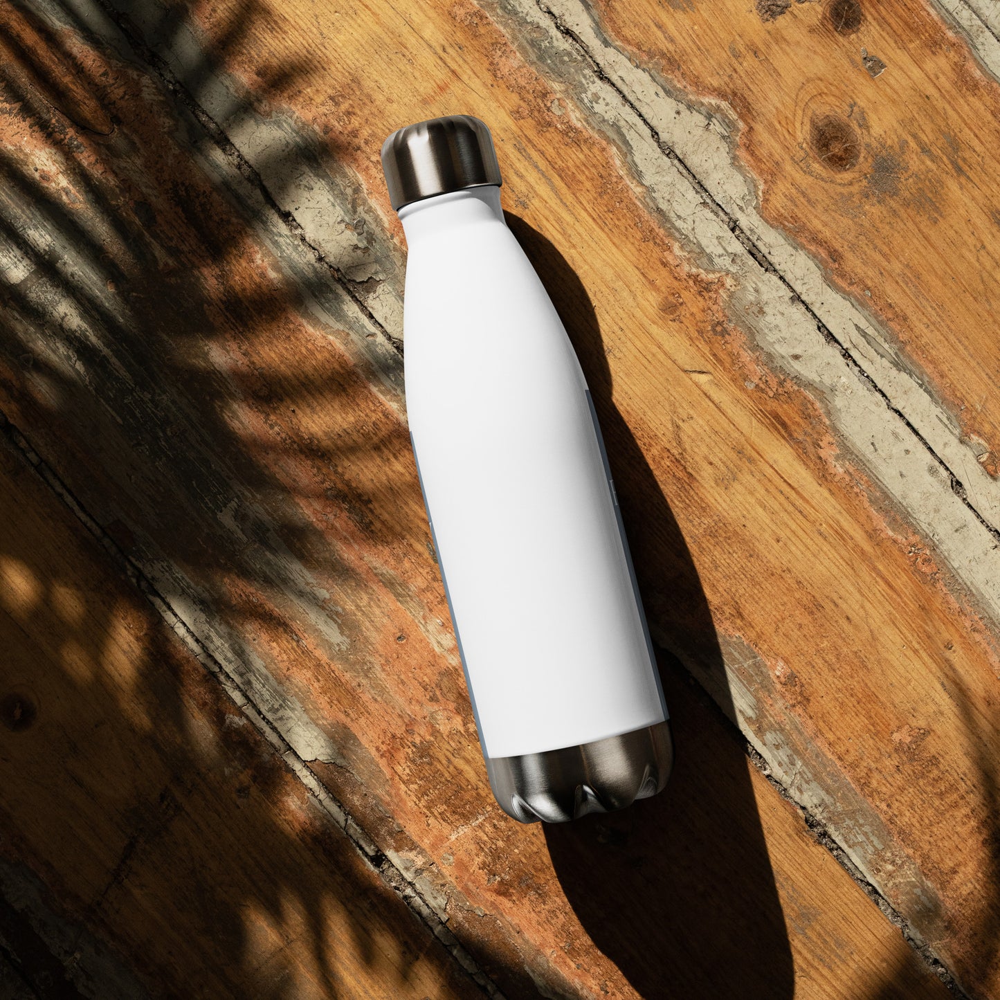 White 17oz stainless steel Dolores Park Water Bottle by Fog & Foundry, shown from the back with a sleek design.