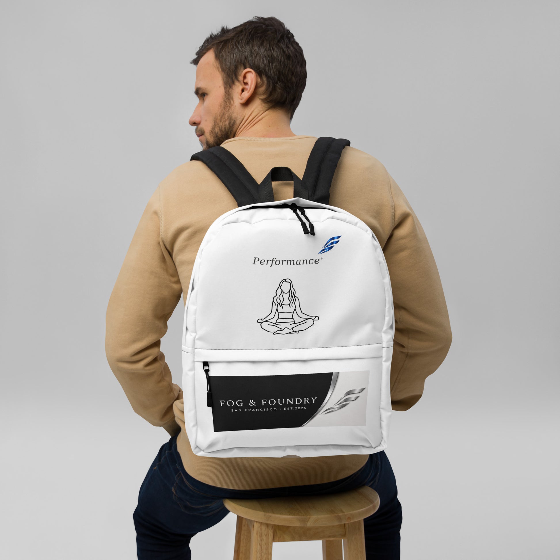 Fog & Foundry water-resistant backpack with all-over print, 15-inch laptop sleeve, padded straps, white design, front view.
