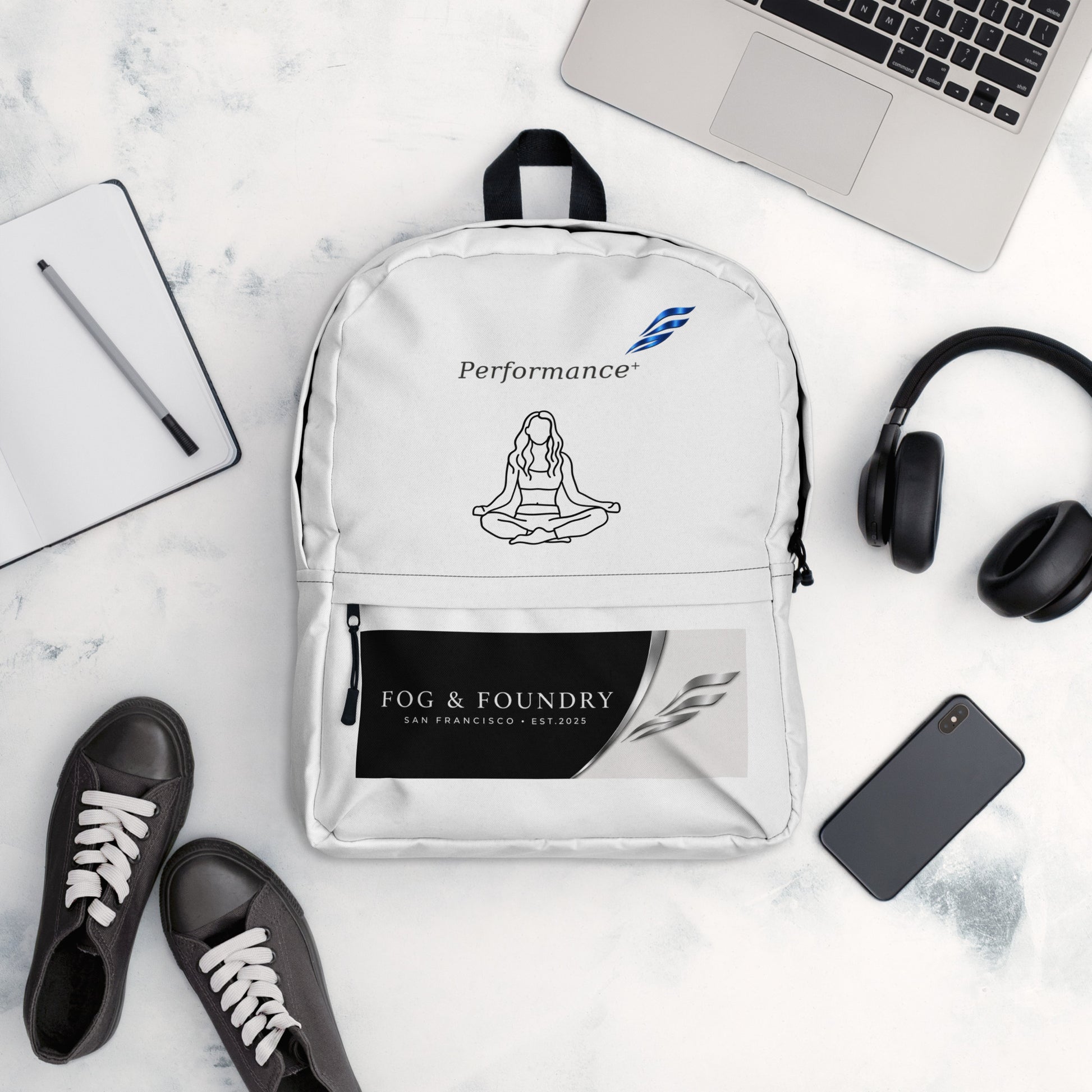 Fog & Foundry water-resistant backpack with 15-inch laptop sleeve, all-over print, padded straps, and white design.