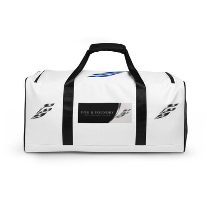 Large Fog & Foundry Performance+ Duffle Bag with all-over white print, showing sturdy handles and spacious design.
