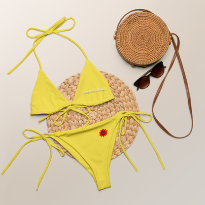 Lemon yellow string bikini by Fog & Foundry featuring an all-over print, recycled fabric, and classic swimwear style.