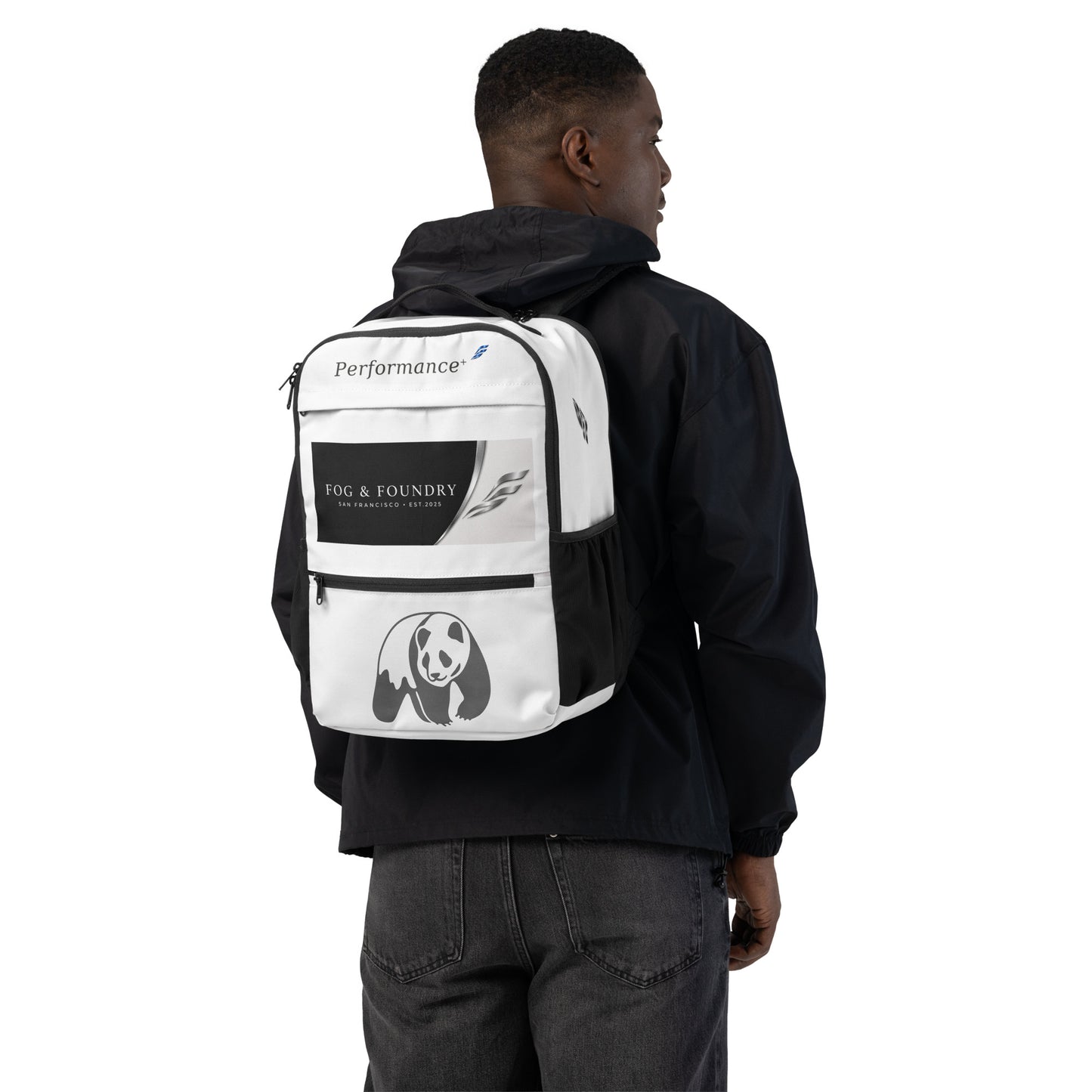White canvas backpack with all-over utility print from Fog & Foundry, featuring multiple compartments and adjustable straps.