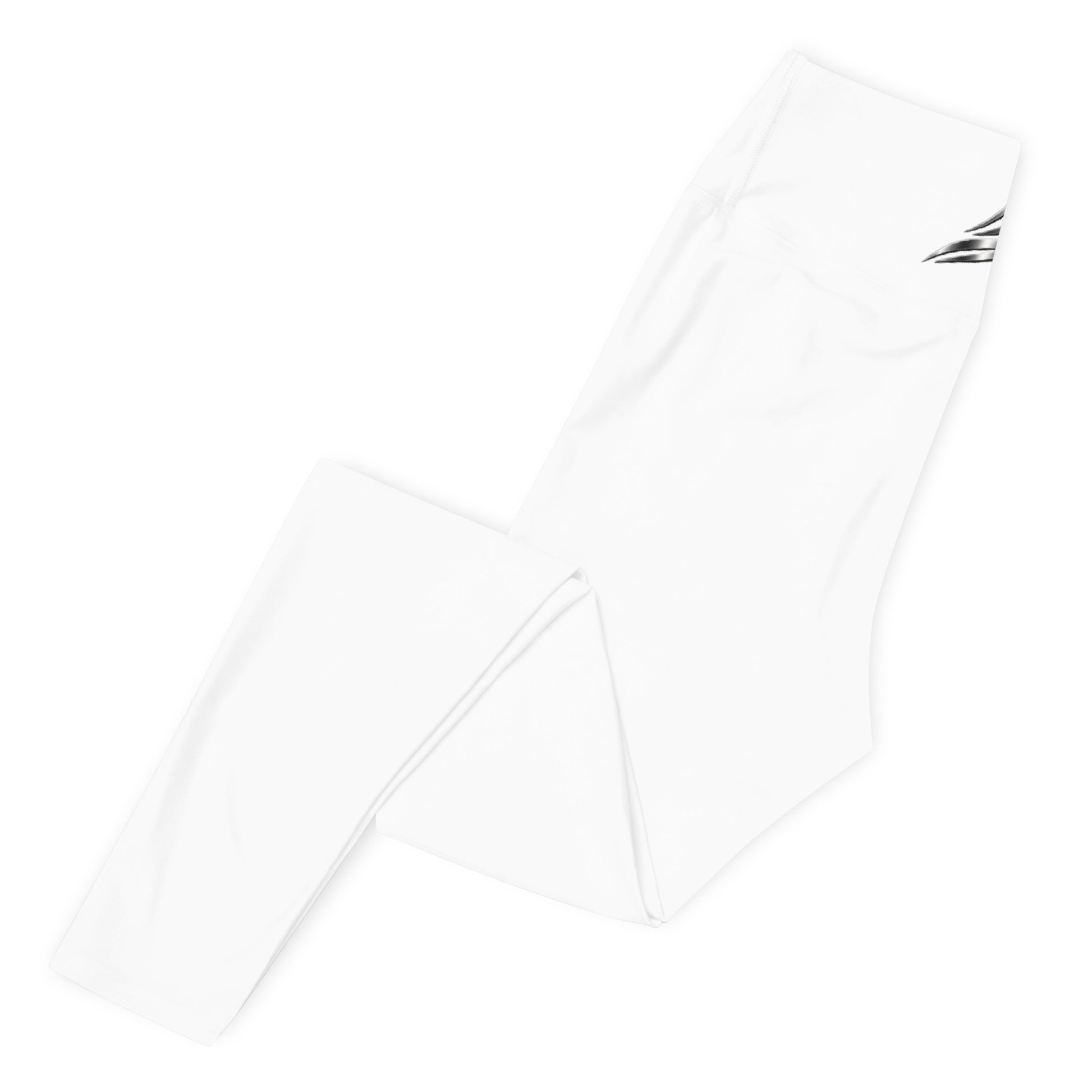 White high-waist yoga leggings with all-over print from Fog & Foundry, displayed on a model's leg.
