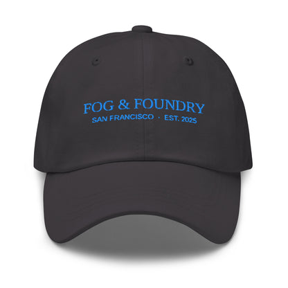 Dark grey embroidered dad hat from Fog & Foundry, featuring classic sportswear style and a curved brim.