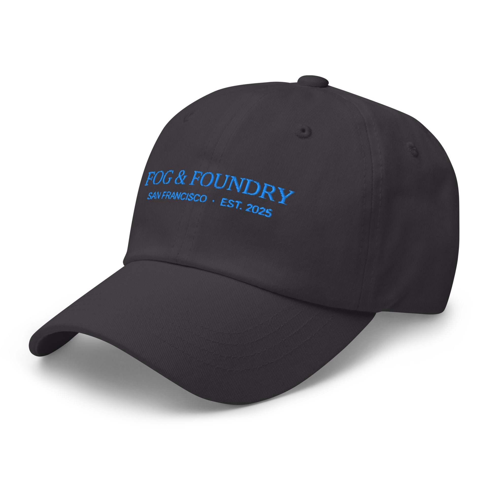 Dark grey embroidered dad hat by Fog & Foundry with classic sportswear style, shown from left front angle.