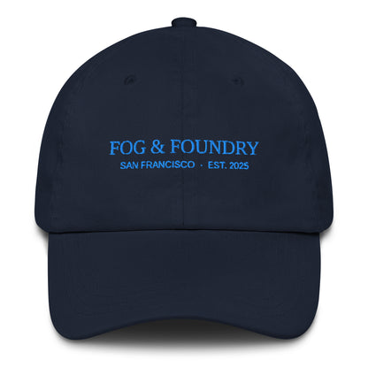 Navy embroidered dad hat by Fog & Foundry featuring a classic sportswear style with front stitching detail.