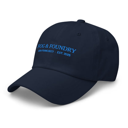 Navy embroidered dad hat from Fog & Foundry, featuring classic sportswear style with a front logo design.