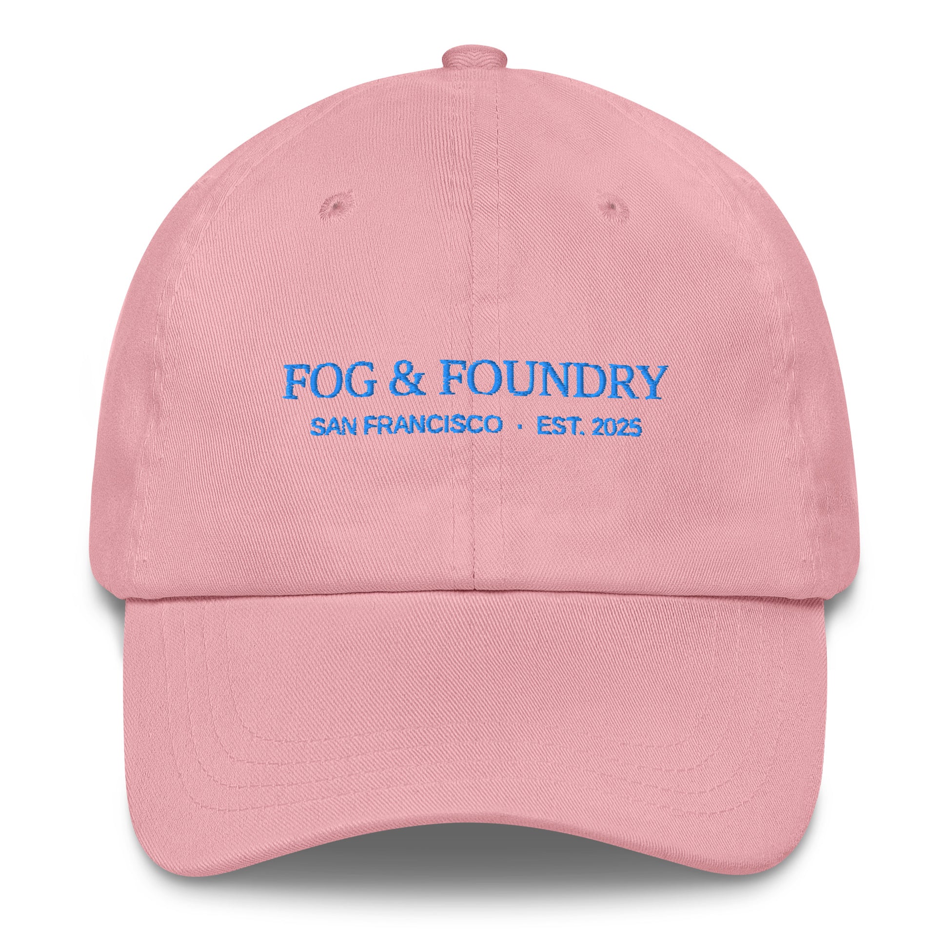 Pink embroidered dad hat by Fog & Foundry featuring a classic sportswear style with front embroidery and adjustable strap.