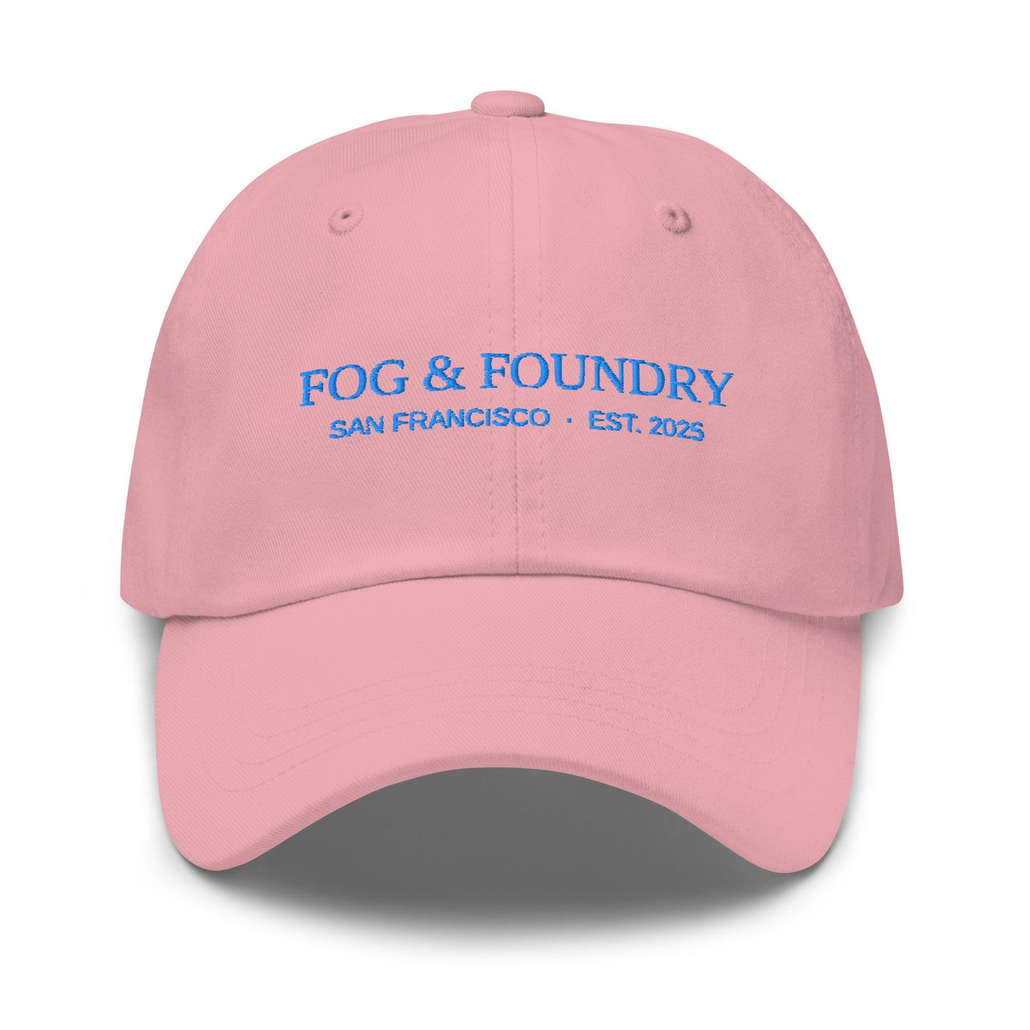 Pink embroidered dad hat from Fog & Foundry, classic sportswear style with front embroidery and adjustable strap.