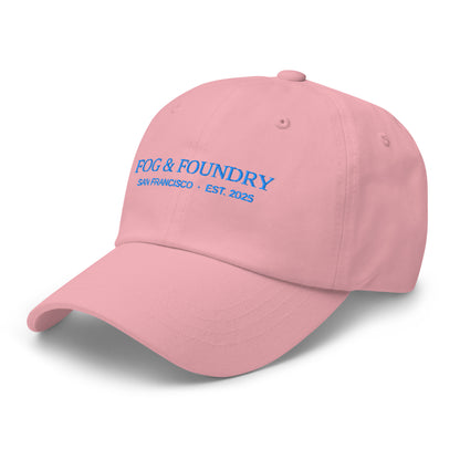 Pink embroidered dad hat by Fog & Foundry featuring classic sportswear style with front left embroidery detail.