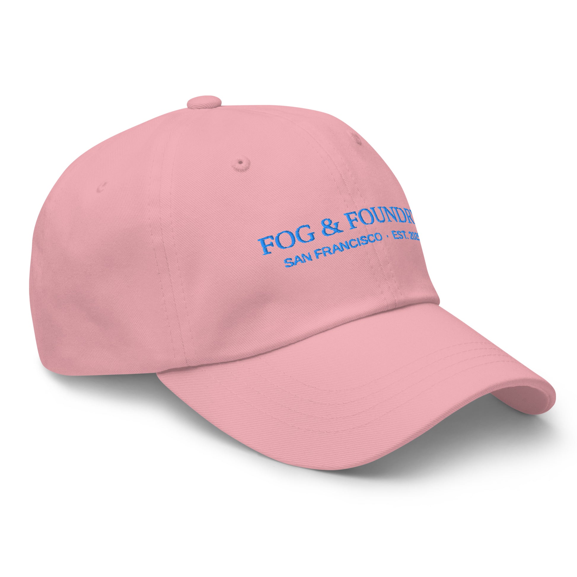 Pink embroidered dad hat by Fog & Foundry, sportswear style with front embroidery, classic adjustable baseball cap.