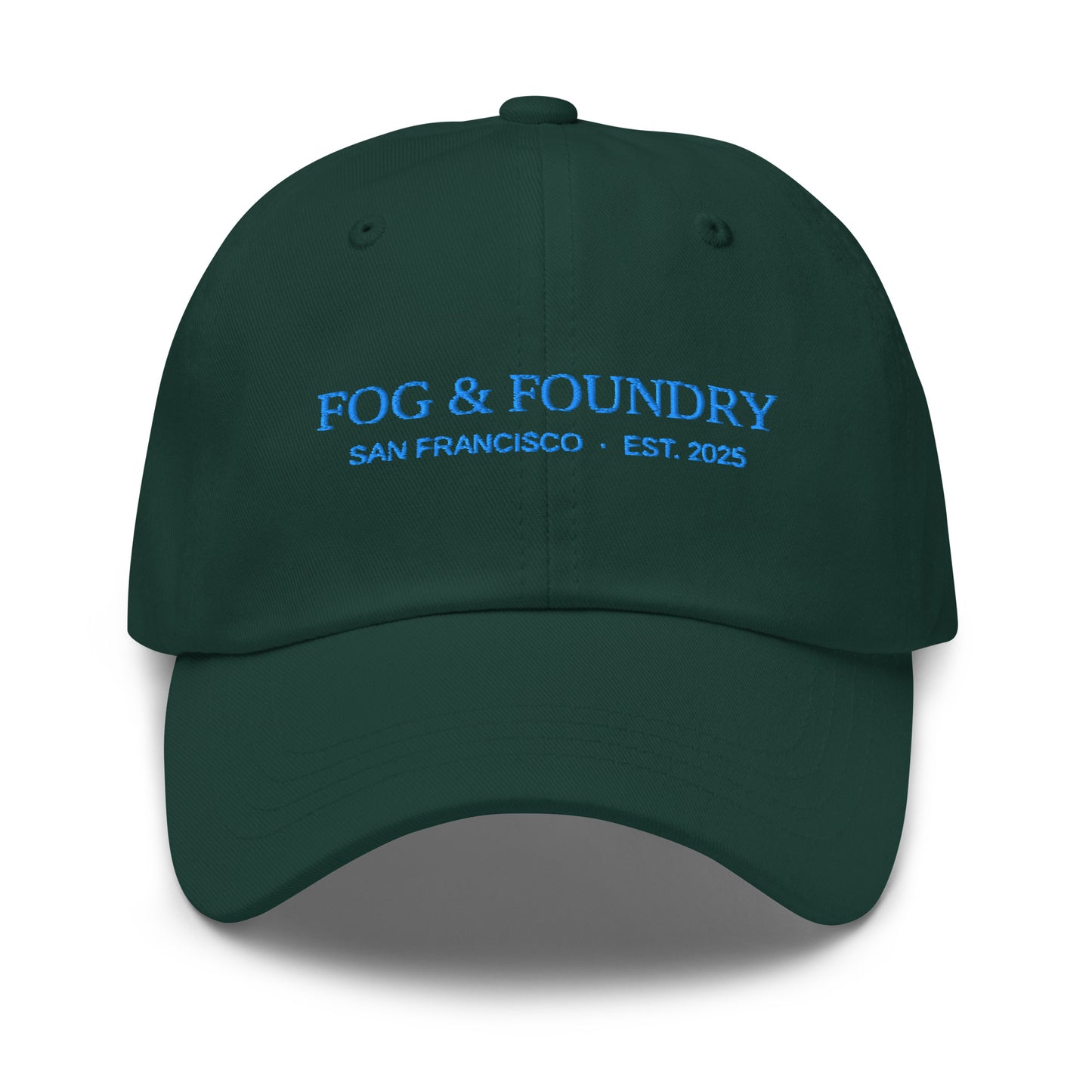 Embroidered classic dad hat in spruce green by Fog & Foundry featuring a curved brim and adjustable strap.