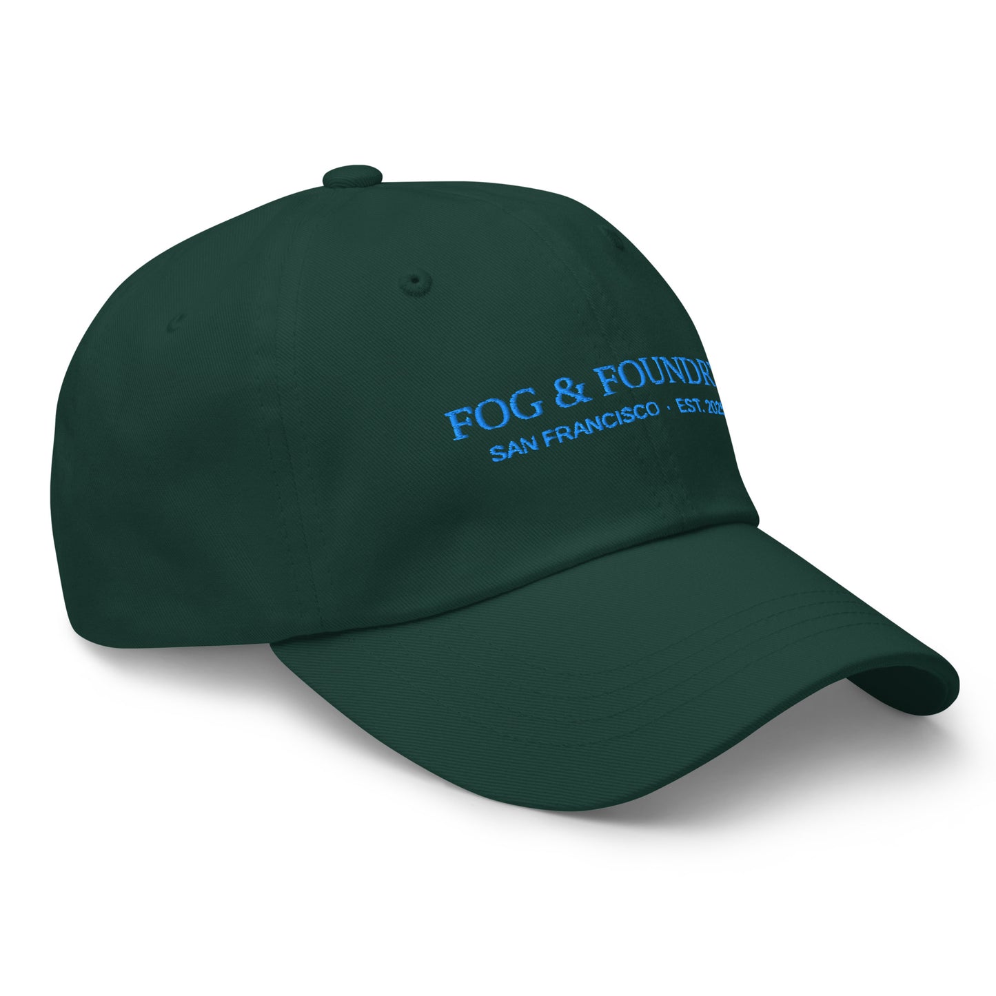 Fog & Foundry embroidered dad hat in spruce color, showing front view with classic baseball style and detailed stitching.