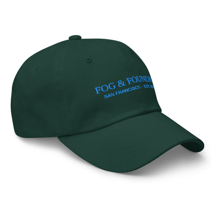 Fog & Foundry embroidered dad hat in spruce color, showing front view with classic baseball style and detailed stitching.