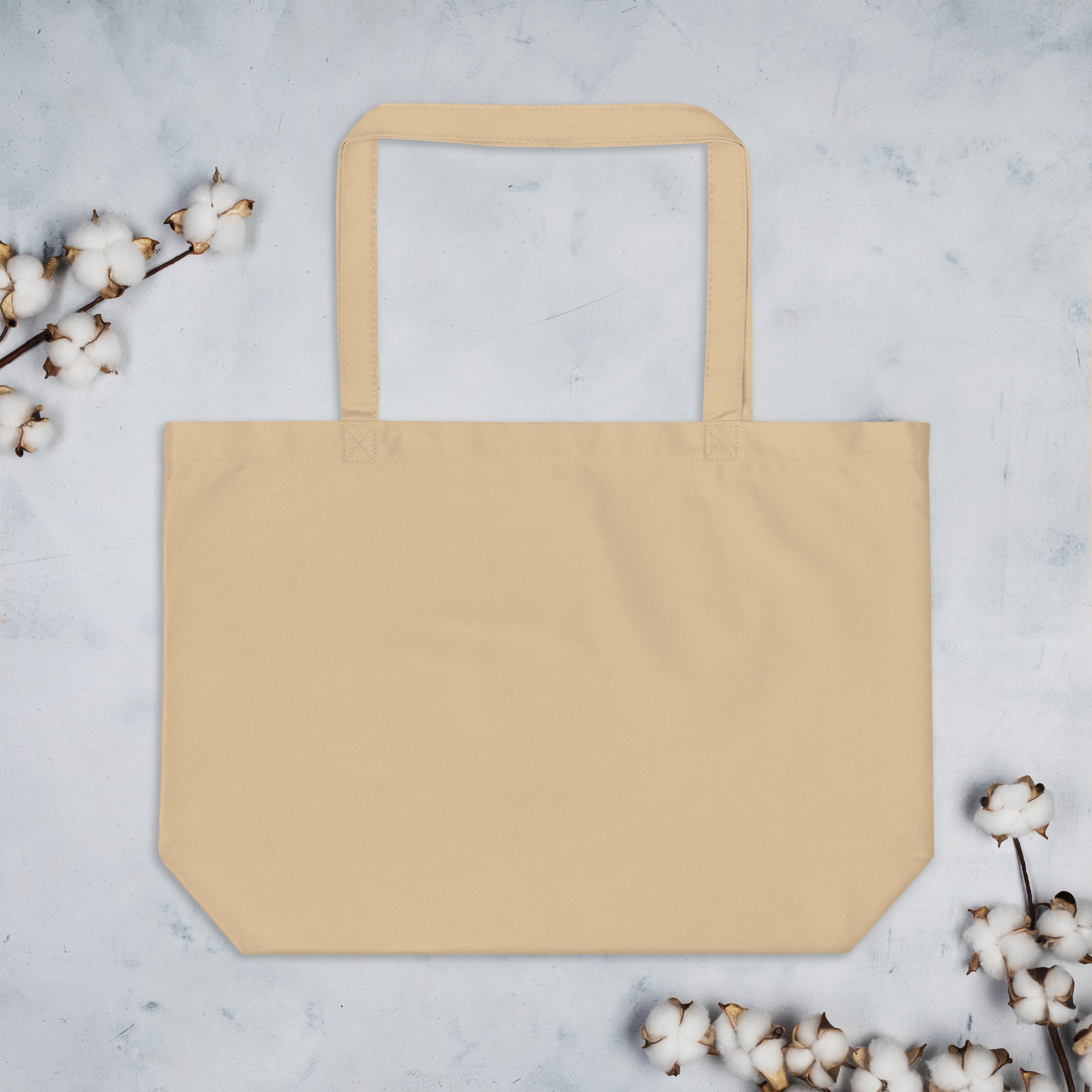 Large purple organic tote bag by Fog & Foundry with oyster-colored back, made from eco-friendly materials, stylish and spacious.