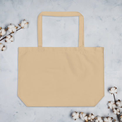 Large purple organic tote bag by Fog & Foundry with oyster-colored back, made from eco-friendly materials, stylish and spacious.