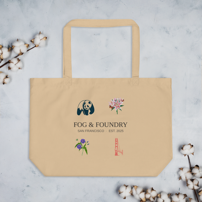 Large organic cotton tote bag by Fog & Foundry with oyster-colored fabric and sturdy handles, ideal for everyday use.