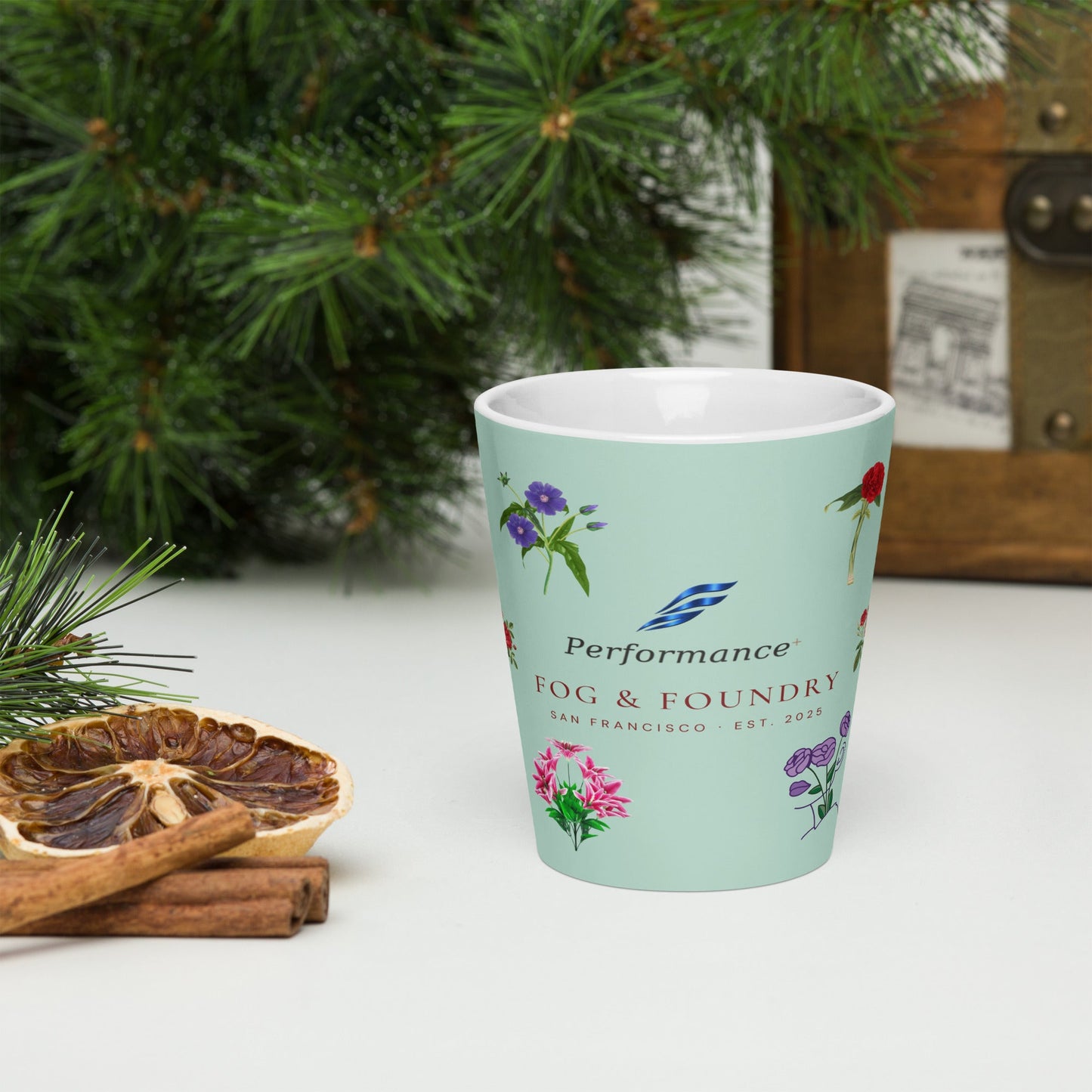 White 12 oz Flower Mug by Fog & Foundry with a floral design, viewed from the front. Ceramic coffee mug for hot beverages.