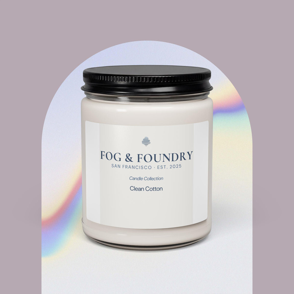 Scented soy candle in a 9oz clean cotton jar by Fog & Foundry, with a white label and a flickering flame.