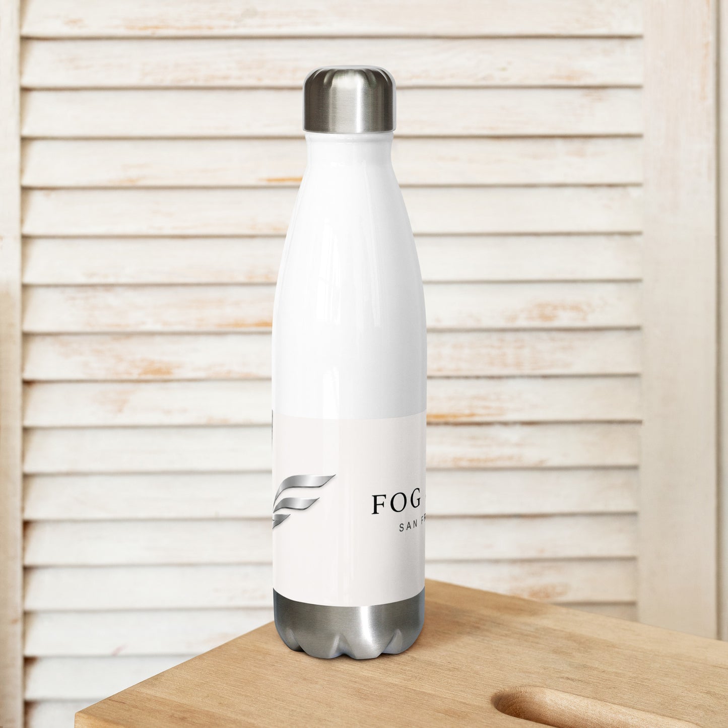 White 17oz stainless steel Twin Peaks water bottle by Fog & Foundry, shown from the back with a sleek design.