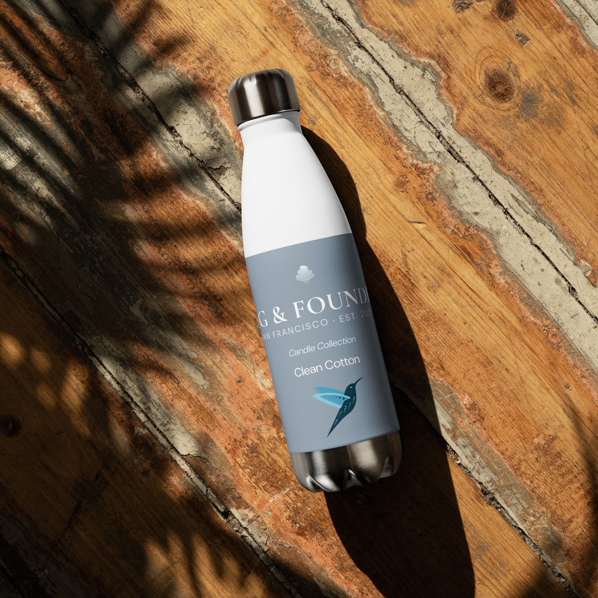 White stainless steel Dolores Park Water Bottle by Fog & Foundry, 17oz, shown from the front with a sleek design.