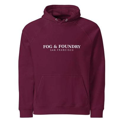 Unisex burgundy organic cotton raglan hoodie by Fog & Foundry, front view showing casual fit and classic style.