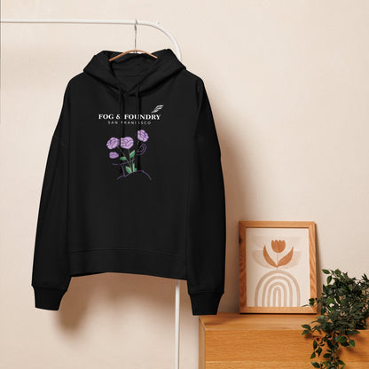 Black organic cotton mid-length hoodie for women by Fog & Foundry, shown from the front with a relaxed fit and casual style.