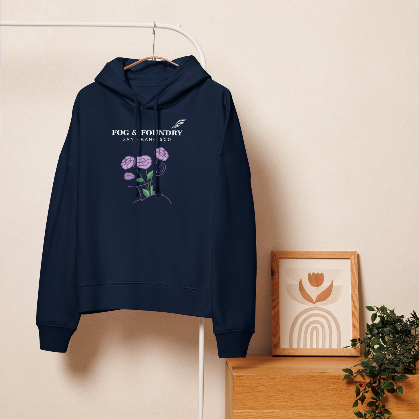 Women’s organic cotton mid-length hoodie by Fog & Foundry, shown in French navy, front view with a cozy, casual fit.
